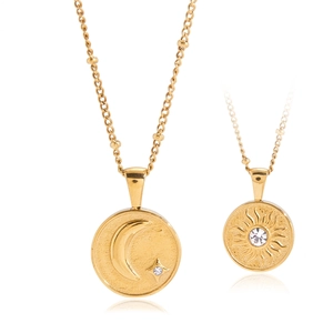 Gold celestial star and moon pendant necklace set with crystal inlay on a thin chain