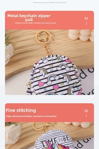 Detail showing the metal hook, smooth zipper, and fine stitching on the unicorn coin purse