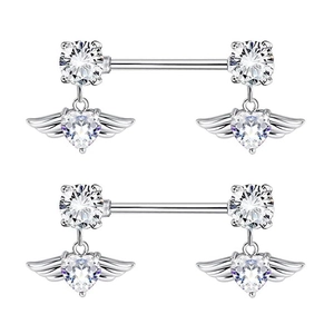 Macro view of silver butterfly nipple rings with heart-shaped clear zircon stones