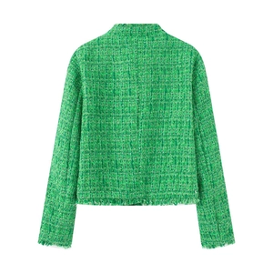 Detailed back view of green tweed jacket showing woven texture and fringe trim