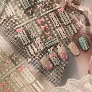 5D embossed bowknot and sweater texture nail stickers with delicate white snowflake patterns