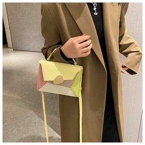 Color-block leather crossbody bag with yellow pink beige and green panels for women