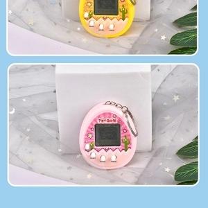 Mini electronic pet game console in yellow and pink with metal keychain and buttons