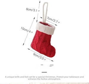 Detailed knit Christmas stocking cutlery holder with red and white textured patterns