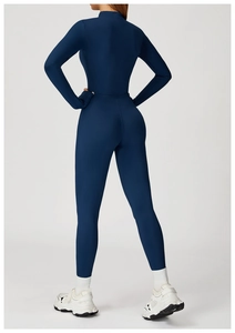 Detail view of navy yoga bodysuit back featuring thumbholes and sculpting seam design