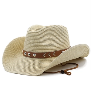 Close-up of woven straw cowboy hat with leather rivet band and adjustable wind cord