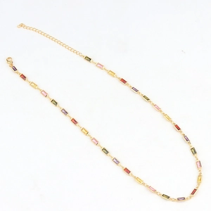 Gold plated link necklace with colorful rectangular zircon stones on white background
