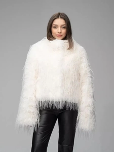 Detailed close-up of white faux fur texture on a cropped jacket with high collar design