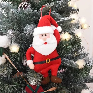 Classic plush Santa Claus ornament with white beard hanging on a decorated Xmas tree