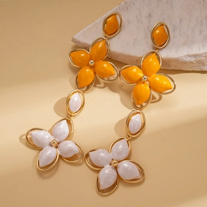 Vintage floral drop earrings with yellow and white enamel in gold-tone setting