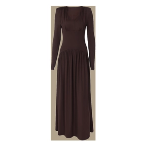 Detail view of dark brown long sleeve knit dress featuring pleated waist and flowy hemline