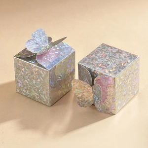 Laser silver butterfly candy gift boxes with shimmering glitter texture for wedding party