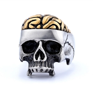 Retro punk skull ring with golden brain accent in vintage silver steel for biker style
