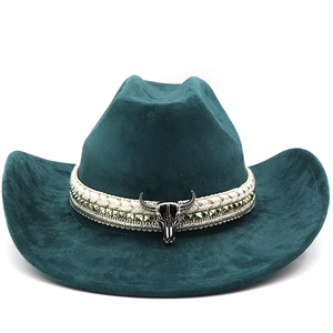 Detail of western cowboy hat with faux suede texture and bull head ornament