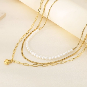 Three-layer stainless steel necklace with white pearls and gold heart lock pendant charm