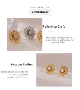 Macro shot of gold and silver sunflower earrings with sparkling zircon centers