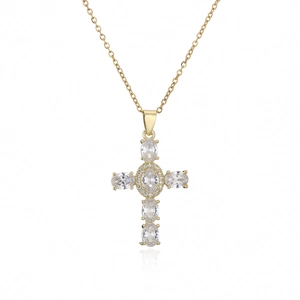 Close-up of gold 18K plated cross necklace with clear oval zircon and micro pavé detail