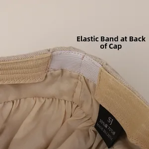 Detail of cotton linen hat interior showing the elastic adjustment band and fabric label