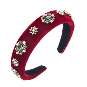 Vintage burgundy velvet headband with baroque pearls and rhinestones on white background