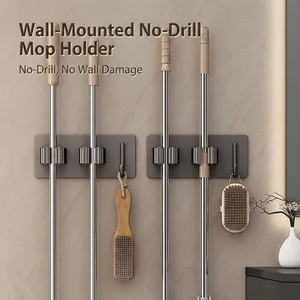 Support de vadrouille mural gris avec crochets adhésifs pour le rangement de la salle de bain
