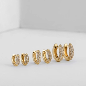 Detailed view of three sizes of 18K gold plated hoop earrings with micro-set cubic zirconia