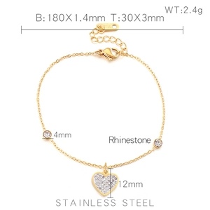 Golden stainless steel heart bracelet for women with rhinestones on white background