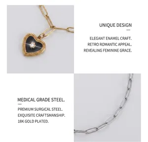 Detail of 18K gold-plated titanium steel chain with a black heart-shaped pendant