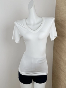 Close-up detail of white V-neck slim fit short sleeve T-shirt for women on mannequin