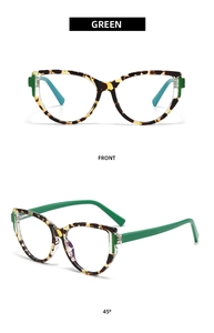 Detailed front and 45-degree angle views of green tortoiseshell cat-eye glasses frames