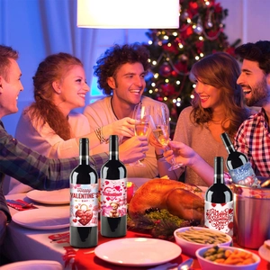 Close-up of Valentine's Day wine bottle labels with romantic heart and bear patterns