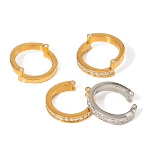 Minimalist gold and silver rings with cubic zirconia inlay on white background