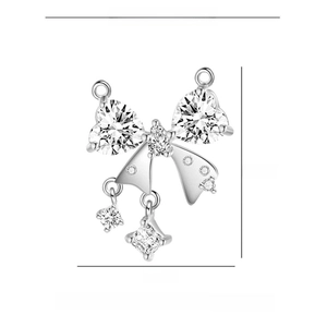 Detail view of bow pendant with size 17mm by 14mm showing clear cubic zirconia stones