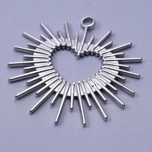 Detailed view of a silver 304 stainless steel heart sunburst pendant for DIY jewelry