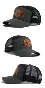 Detail view of the fishing outdoors patch on the mesh back curved brim baseball hat