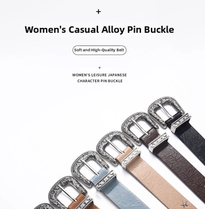 Close-up of vintage carved alloy buckles on colorful punk rivet belts for women