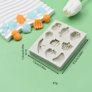 Silicone fruit mold for fondant and chocolate featuring strawberry and banana shapes