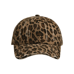 Distressed leopard print baseball cap with vintage washed fabric and adjustable strap