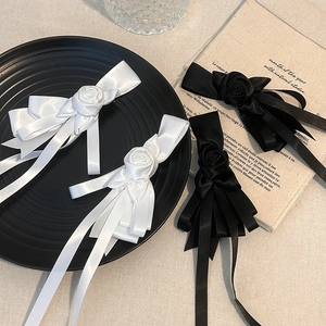 French retro satin bow hair clip with fabric rose and long ribbons in black and white