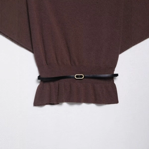 Elegant dark brown knit sweater with waist belt and pleated ruffle hem detail