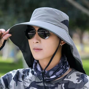 Detail of grey outdoor sun hat featuring wide brim and protective neck flap for fishing