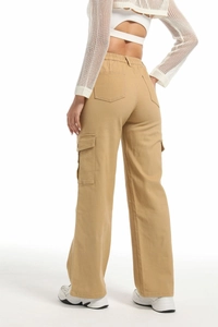 Detail view showing back pockets and elastic waist on khaki wide leg cargo pants