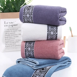 Thick cotton bath towel set in four colors with minimalist geometric border decoration