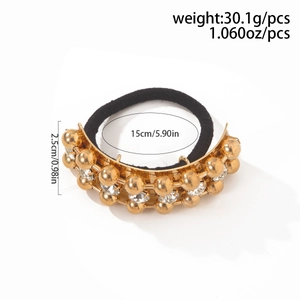 Detail view of gold alloy ponytail cuff with rhinestones and precise size measurements