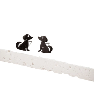Minimalist black stainless steel puppy silhouette stud earrings for women on white stone