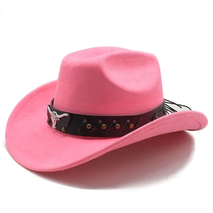 Detail of rose pink cowboy hat featuring a leather band with silver bull head emblem