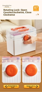 Detail of orange rotating lock on large family first aid kit with usage instructions