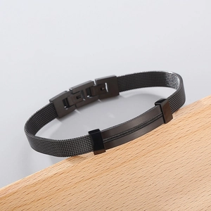 Men's black stainless steel woven mesh chain bracelet with polished curved bar detail
