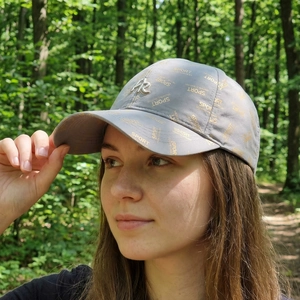 Grey quick-dry sport baseball cap with AR logo and gold print for outdoor activities