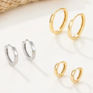 Detail view of 925 sterling silver hoop earrings in three sizes with S925 hallmark