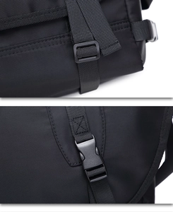 Macro shot of durable nylon fabric and plastic buckle detail on black messenger bag
